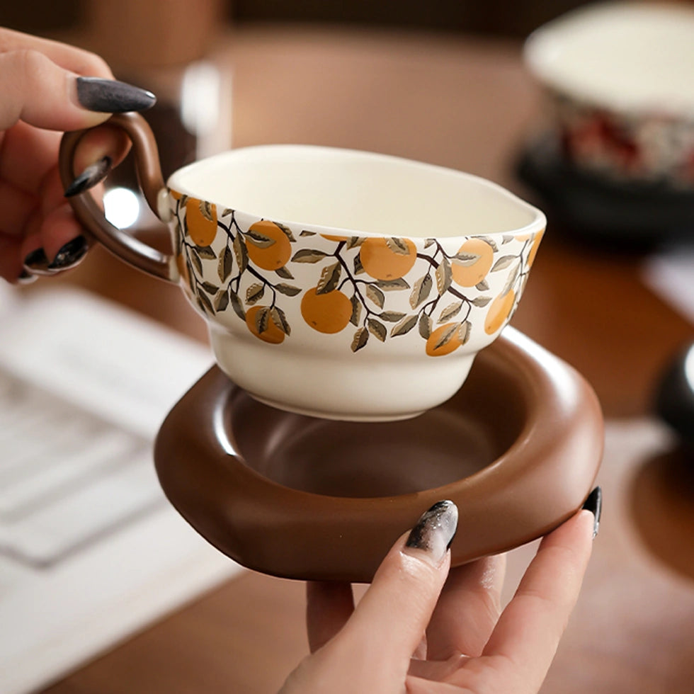 Ceramic Mug with Orange Branch Pattern & Saucer