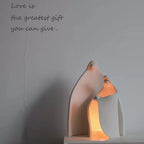Minimalist ceramic family sculpture candle holder symbolizing love and shelter