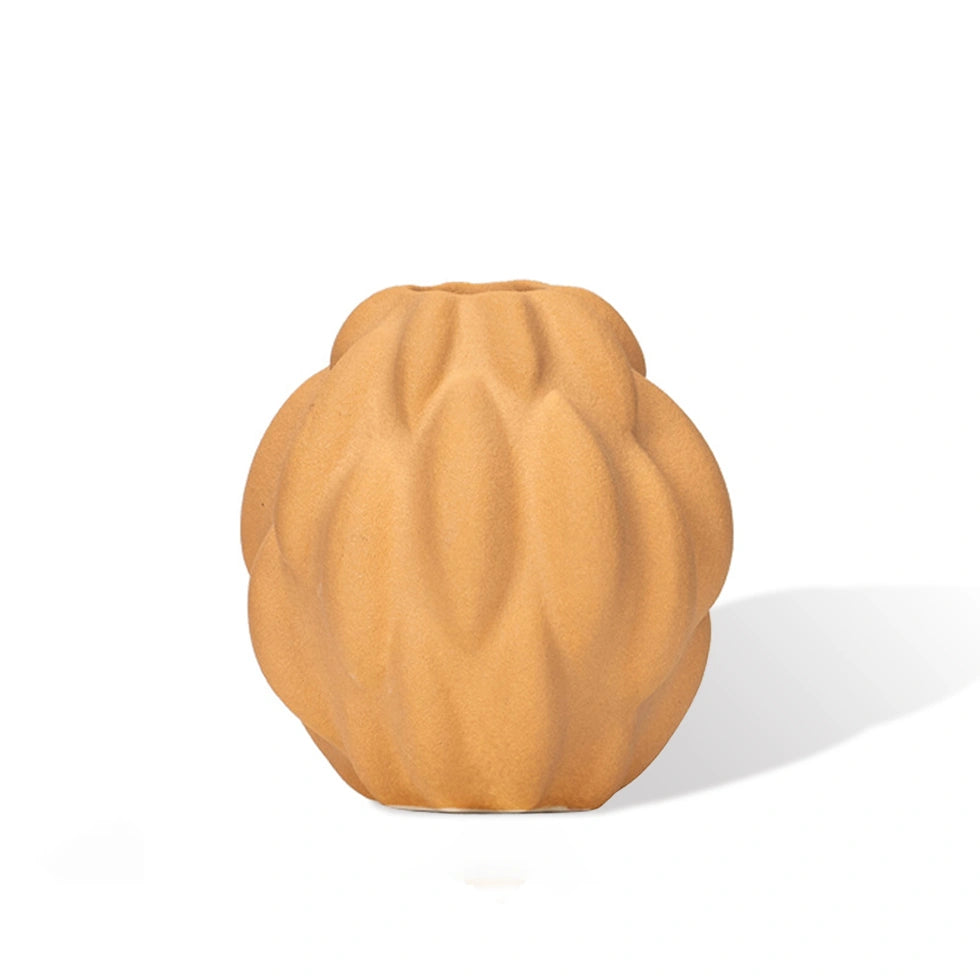 yellow ceramic vase